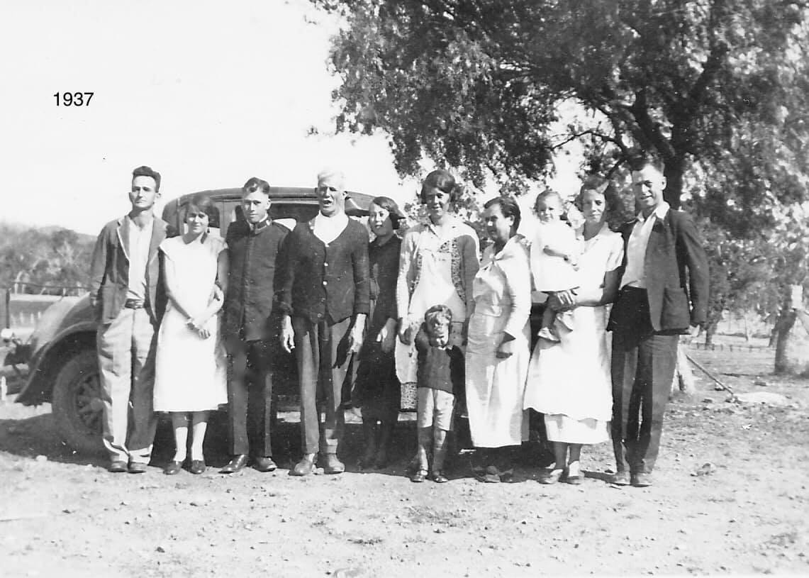 Family group in front of a car, 1937